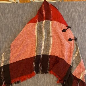 Red plaid shawl/cape with high neck. Excellent condition